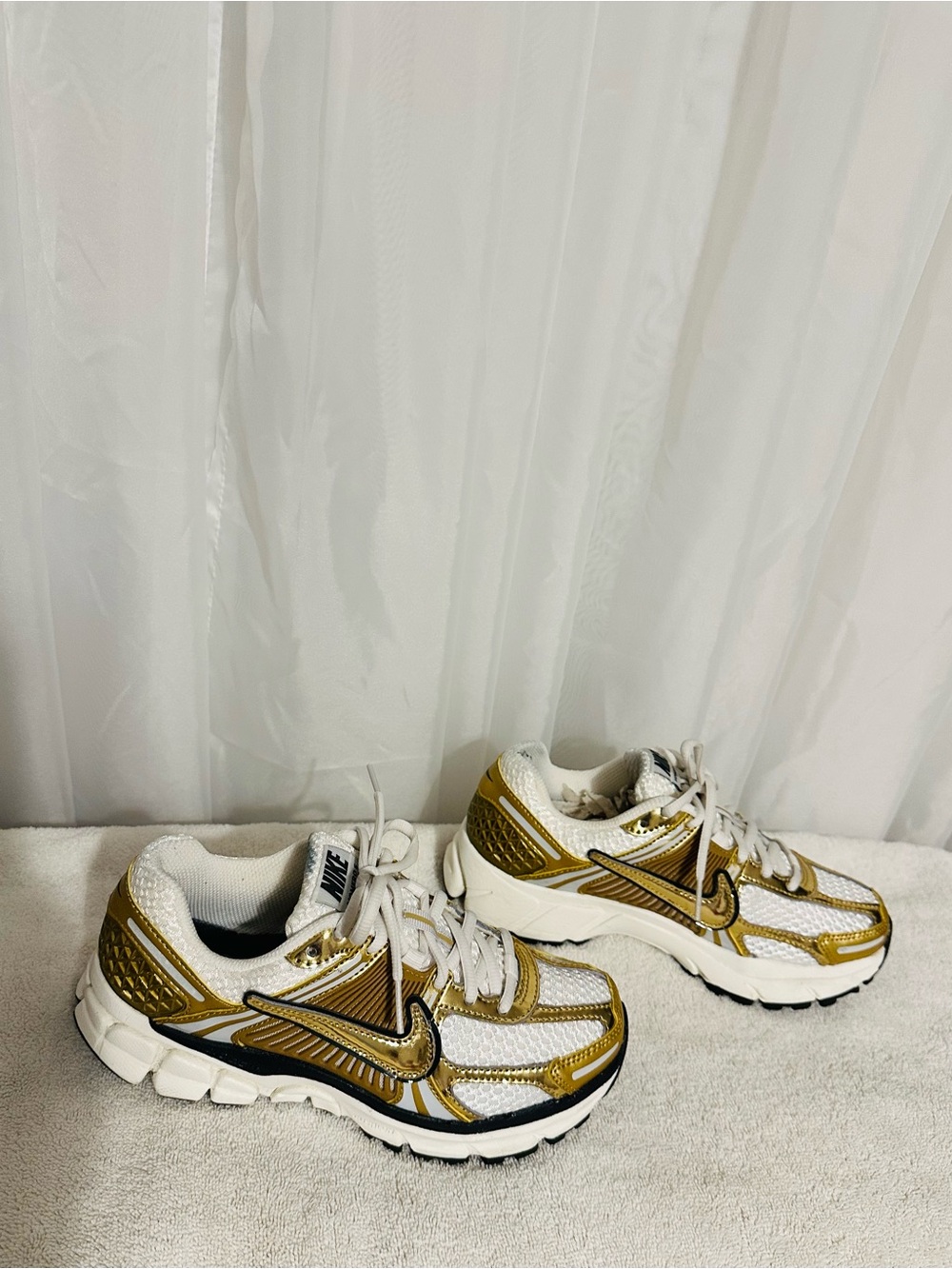 Nike White and Gold Athletic Sneakers